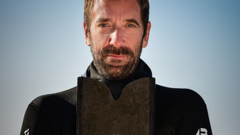 Take a deep breath: Freediver Nik Linder explains what breathing means to him Medium close-up of Nik Linder in a diving suit