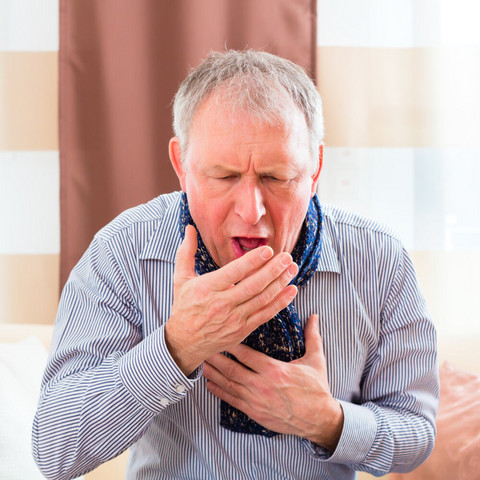 FAQs and answers to all your questions about inhalation for COPD Coughing elderly man holds one hand to his chest, one in front of his mouth