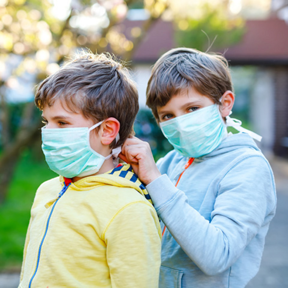 Wearing a face mask Wearing a face mask