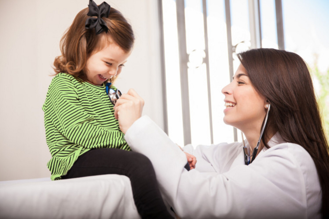What can be done if a child has mucus in their throat: At the doctor Little girl being examined by doctor