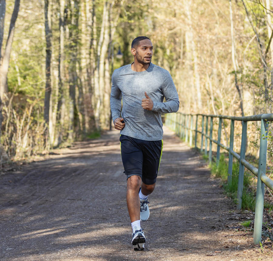 The patient: an important therapy partner Person jogging along a forest path outdoors