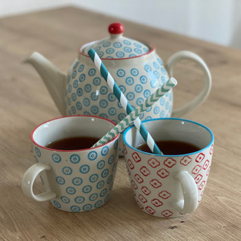 What can be done if a child has mucus in their throat: Drink plenty Jug and two cups with straws on the table