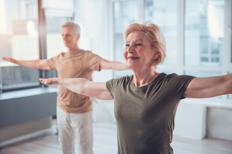 FAQs Inhalation for COPD: Older people doing sports Older woman and man doing yoga