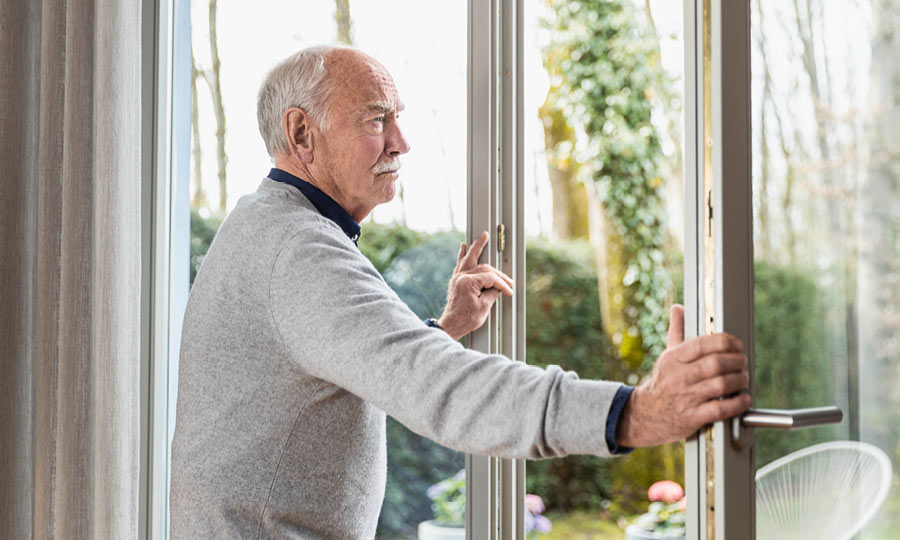 A man opens the window to prevent a cold